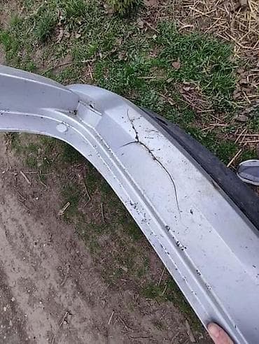 Vozila: BRANIK SIVI ZA HYUNDAI TUCSON | Branik sa ostecenjem koje se vidi — 3