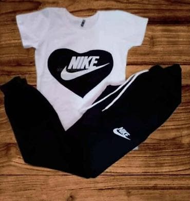 zenski satovi do 3000 dinara: Ženski sportski komplet majica i donji deo trenerke sa dzepovima. Bela — 2