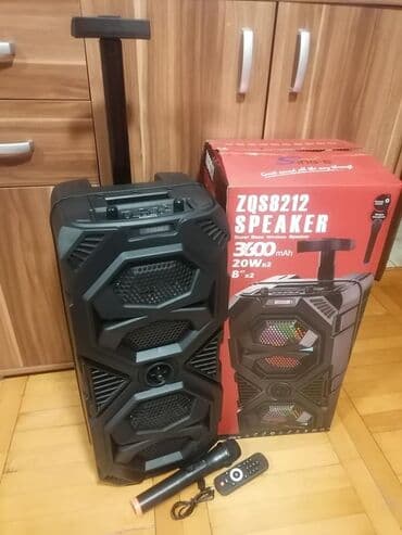 radio na solarno punjenje: Prenosni blutut laraoke zvučnik sa bežičnim mikrofonom. Cena : 9000din — 2