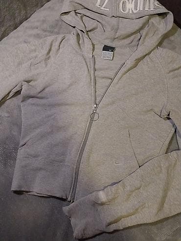 Nike ženska dukserica sa kapuljačom, siva, rajsferšlus celom dužinom na lalafo.rs Nike ženska dukserica sa kapuljačom, siva, rajsferšlus celom dužinom