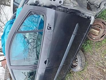 oglasi za motore: PREDNJA DESNA VRATA ZA RENAULT MODUS — 1