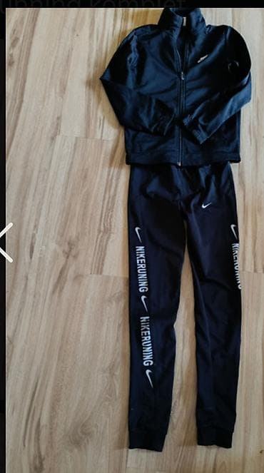Prodajem komplet Nike trenerka,original,mokra likera,nenošena,M