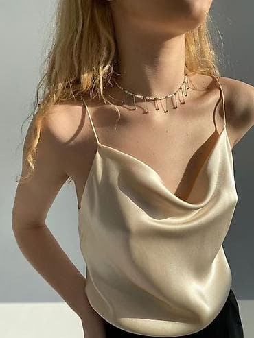 majice bre: Satenski krop top sa tankim bretelama
1550 din
S M L — 8