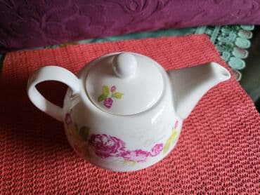 Čajnici: Bokalcic nov porcelanski. Bokal. Visina. 9cm. Duzina celog — 5