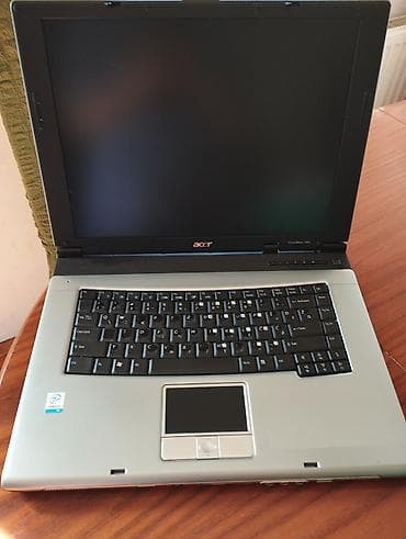 Acer TravelMate 2300 serija – prenosni računar sa slika. Nema punjac