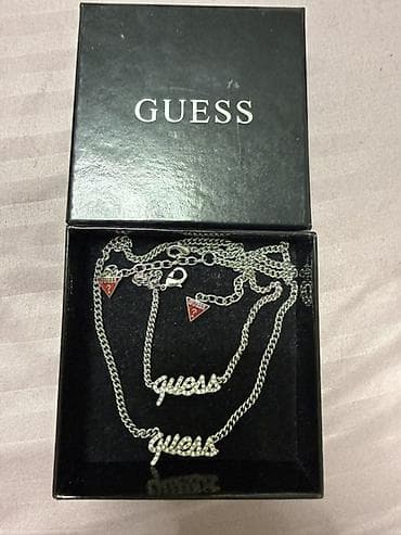 GUESS set ogrlica + narukvica - Brend: GUESS - Materijal: metal u