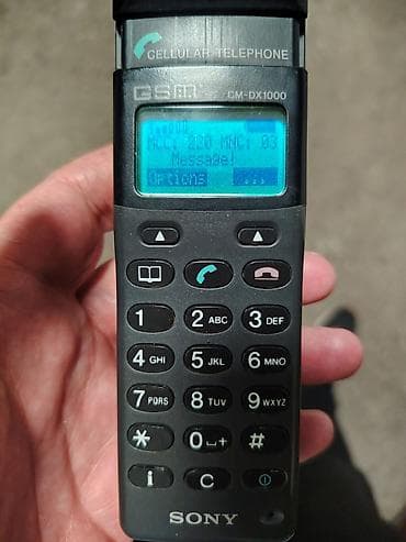 igre beograd: Sony GSM CM-DX1000 mobilni telefon (retro), ima kutiju, punjač, fu — 7
