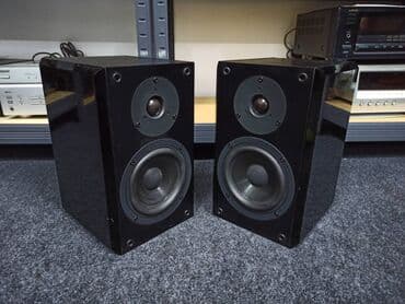 Foto i video kamere: Yamaha NX-E 100 Type: 2 way, 2 driver loudspeaker system Frequency — 5