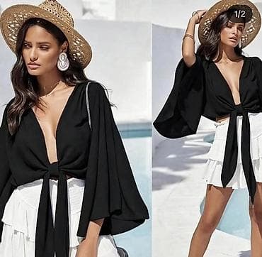 Bluza sa vezivanjem napred. - Model: lepršava bluza sa dubokim V