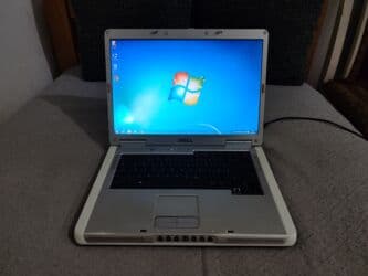 Packard Bell: 2 GB OZU, 15.4 " — 1
