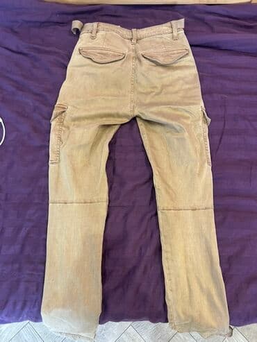 polovne trenerke muske: Ženske uske cargo pantalone u bež/peščanoj boji. - Materijal — 2