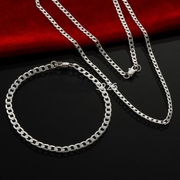 versace nakit: Set nakita žig 925 Elegantni set od lančića i narukvice izrađen od — 2