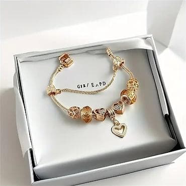 narukvice sa krstom: Narukvica sa perlama i šarmovima – srebrni ton, crno-srebrna — 8