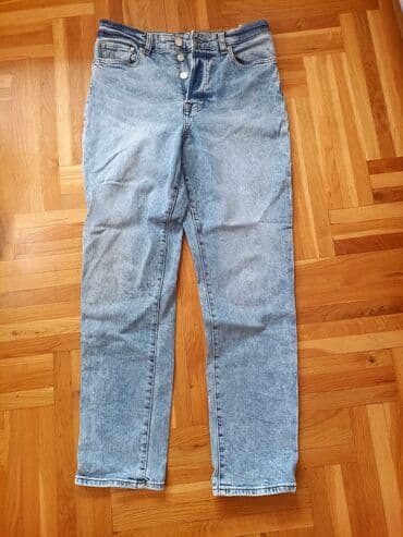 Ostala ženska odeća: Ženske farmerke od svetloplavog teksasa (stone wash), klasičan kroj sa — 1