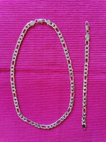 Cena: 2100din
Dimenzije
Debljina:8mm dužina narukvice:20cm
Dužina:50cm