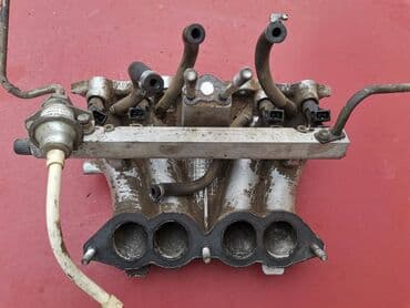 gasni amortizeri dimenzije: Usisna grana sa diznama Lada 21214 Niva. Polovno, očuvano. Skinuto sa — 2