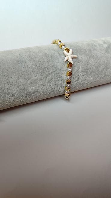 svetlece pidzame beograd: Narukvica sa morskom zvezdom – elegantan letnji aksesoar - Dizajn — 1