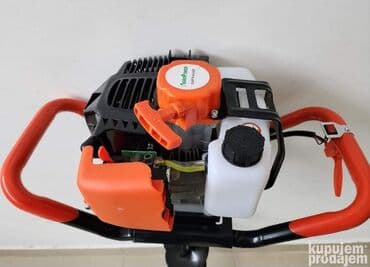 za busenje rupa na kaisu: Prodajem nov i kvalitetan benzinski bušač rupa. Snaga: 52 CC Model — 1