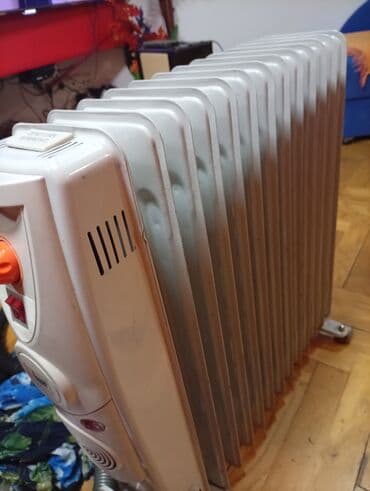 Donji delovi trenerke: Ulje­ni radijator na točkićima - Tip: električni uljni radijator sa — 2