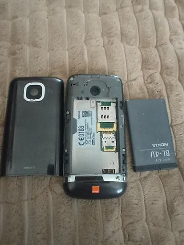 midnight boja: Nokia touchscreen telefon sa fizičkim tasterima za poziv i prekid — 5