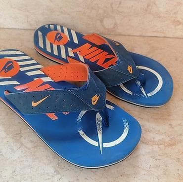 Nike japanke – muški model - Boja: plava osnova sa narandžastim na lalafo.rs Nike japanke – muški model - Boja: plava osnova sa narandžastim