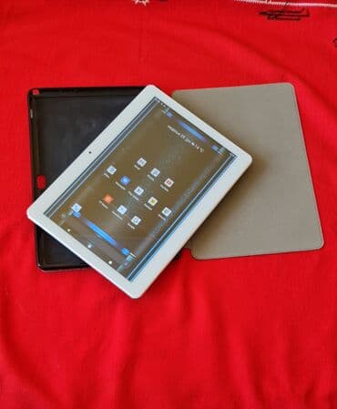 knjiga i zvucnik: Tablet sa 2 sim kartice kao nov sve radiveliki 10 inca, ekstra — 10