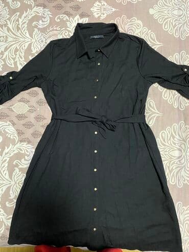 Haljina iznad kolena,nosena jednom.Jako prijatnog materijala,rukavi