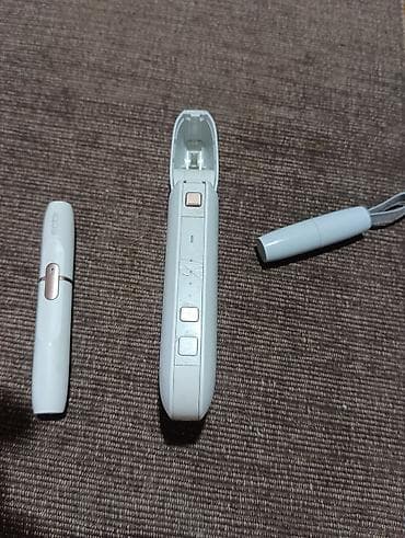 polovni zippo upaljaci: IQOS uređaj za zagrevanje duvana – bela boja - Komplet uključuje: - — 4