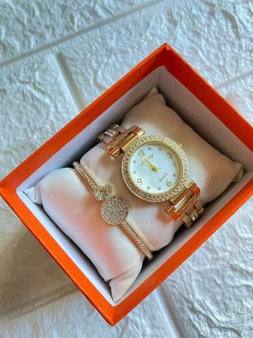 tommy hilfiger d: Narukvica i sat 
2500 din — 1
