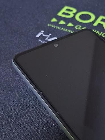 wireless headphones cena: Samsung Galaxy A-serija, bela boja. Telefon sa četvorostrukom zadnjom — 7