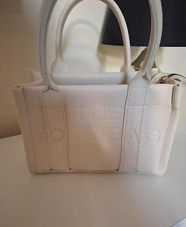 torba za hranu: Bela tote torba sa utisnutim natpisom “THE TOTE BAG”. Kompaktnih — 1