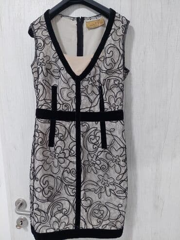 letnje pamucne haljine: Elegantna haljina sa cipkom velicina M/L — 1
