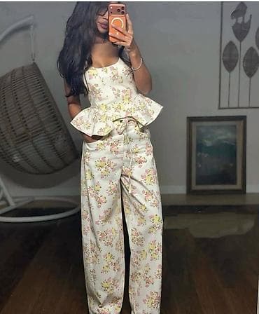 topici: Dvoset ženski komplet – top sa peplum detaljem i široke pantalone - — 4