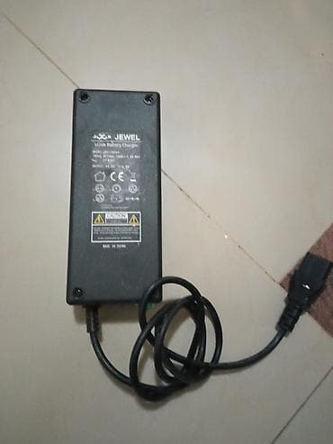 monitor za racunar: Punjač za litijumsku bateriju JEWEL - Model: JH11084A - Ulaz: 42–70 V — 1