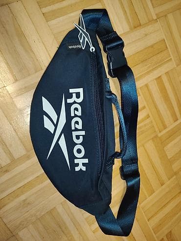 Muzički instrumenti: Reebok sportska torbica za struk/prsni pojas - Boja: crna sa belim — 1