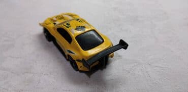 kovanice od 20 dinara sa likom cena: Hot Wheels Toyota Celica Pikes Peak,oko Thailand malo izgreban — 3
