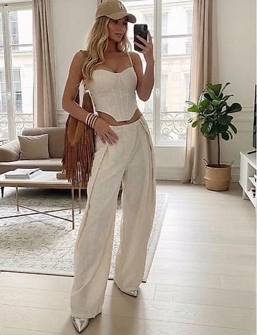 katrin topovi: Dvodelni set – korzet top i široke pantalone
3600 din
S M L — 2