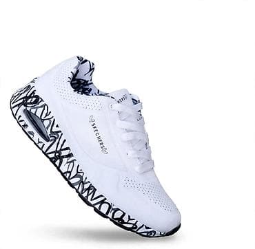 Skechers patike – bele sa crno‑belim grafiti đonom - Model sa