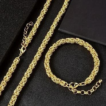 Zlatni set nakita – ogrlica i narukvica, pletena 🛒2,699 din. -