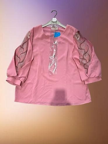 Elegantna bluza sa cirkonima na rukavima. Veca serija 46-54 na lalafo.rs Elegantna bluza sa cirkonima na rukavima. Veca serija 46-54