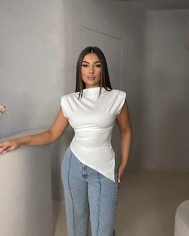gucci majice original: Asimetrična ženska majica bez rukava
1400 din — 9