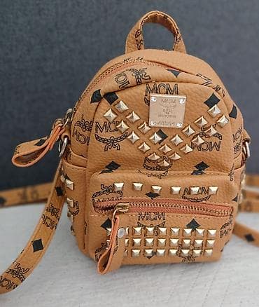 Mini ranac MCM, boja konjak/karamela sa karakterističnim MCM monogram