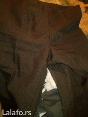 Ženska odeća: Svecane pantalone na ivicu vel l jednom obucene crne