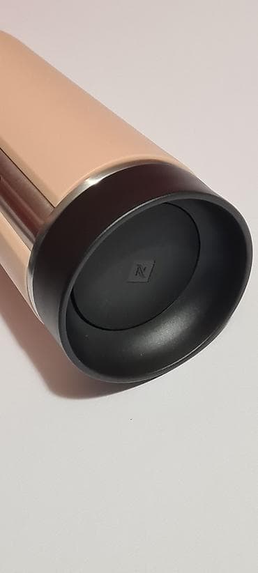 kante za smece: Nespresso Nomad termo putna šolja u krem boji.  - Materijal: Nerđajući — 6
