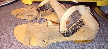 Ženske ravne sandale u bež/peščanoj boji sa dekorativnim resama i na lalafo.rs Ženske ravne sandale u bež/peščanoj boji sa dekorativnim resama i