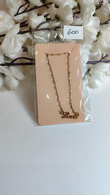 Zlatno-tonirana ogrlica sa priveskom “Love”. - Materijal: modni nakit