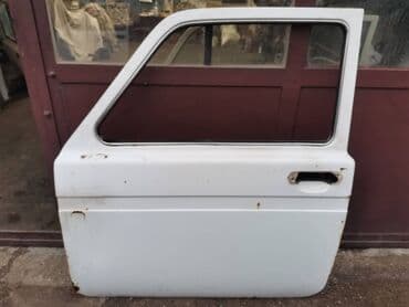 polovne letnje gume 215 55 r16: Dodatni opis Vrata leva Lada 21213,21214 Niva u beloj boji. Polovna — 1