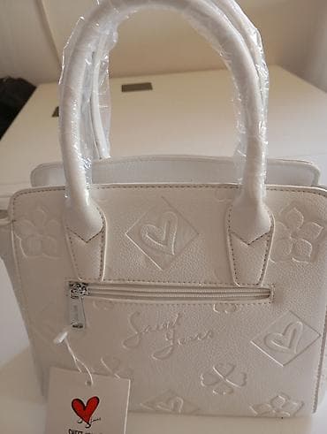 Karakteristike predmeta Proizvođač: SWEET YEARS Boja: Bela Izgled 