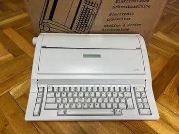 cena srpski dukat: *** SUPER AKCIJA *** #2782 Elektronska pisaća mašina Optima SP 24; — 2