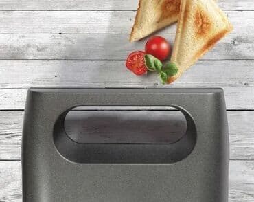 ručni masažer: Tehnički detalji Opšte Vrsta aparata: Mini gril Materijal ploča — 4